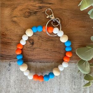 Oilers blue orange and white wristlet!